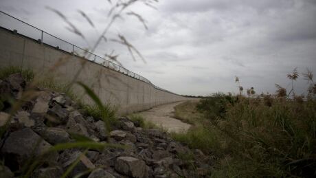 In this Jan. 5, 2016 photo, a section of border wall stands in Anzalduas Park in Mission, Texas, across the Rio Grande from Reynosa, Mexico. Mexico-Texas border