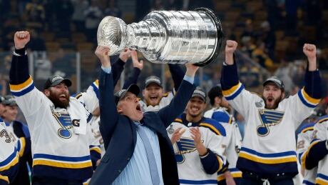 Craig Berube celebrates with the Stanley Cup after his team defeated the Boston Bruins to claim their first NHL championship. APTOPIX Stanley Cup Blues Bruins Hockey