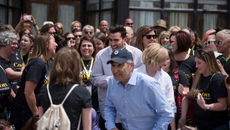 Dan Levy, Eugene Levy and Jennifer Robertson meet fans during a break from filming Schitt's Creek in Goodwood, Ont., on Sunday, June 9, 2019. THE CANADIAN PRESS/ Tijana Martin TV Schitts Creek Goodwood 20190627
