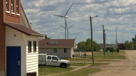 Wind turbines are easy to see from Dale Gonda's Halkirk yard, he doesn't mind the shift to wind power but hopes Alberta can remain an oil and gas producing area. Dale