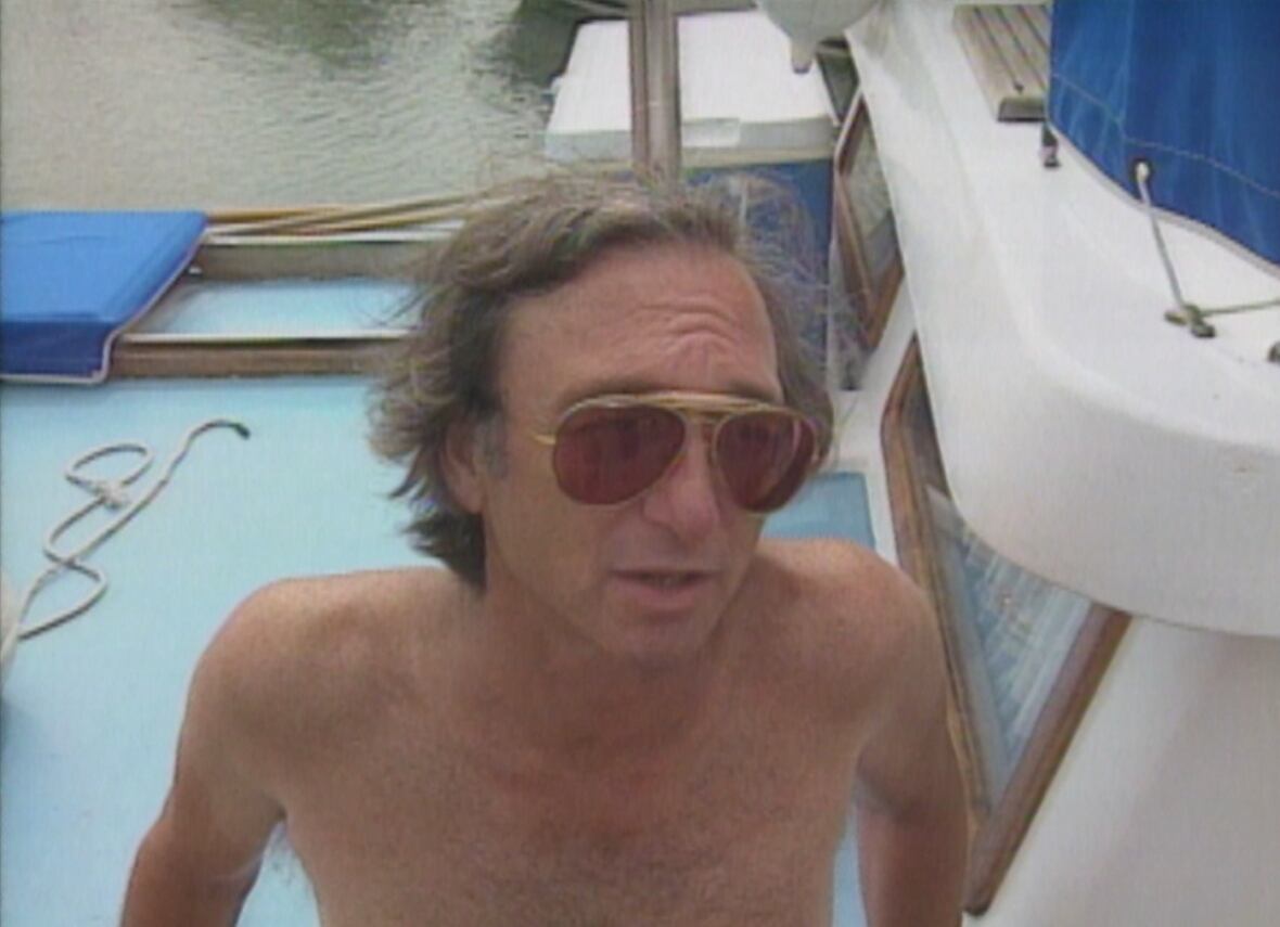 Shirtless man wearing sunglasses