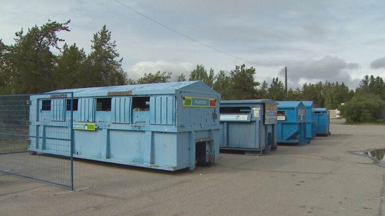 Blue recycling bins in Yellowknife.