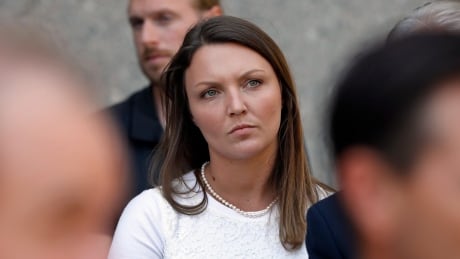 Courtney Wild, one of Jeffrey Epstein's accusers who spoke at his bail hearing, attends a news conference outside federal court, in New York, Monday, July 15, 2019. Wild said Monday in Manhattan federal court that she was abused by the wealthy financier in Palm Beach, Florida, starting at age 14. (AP Photo/Richard Drew) Sexual Misconduct Epstein