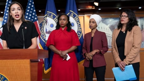 From left, Rep. Alexandria Ocasio-Cortez, D-N.Y., Rep. Ayanna Pressley, D-Mass., Rep. llhan Omar, D-Minn., and Rep. Rashida Tlaib, D-Mich., respond to remarks by President Donald Trump after his call for the four Democratic congresswomen to go back to their "broken" countries, during a news conference at the Capitol in Washington, Monday, July 15, 2019. All are American citizens and three of the four were born in the U.S. (AP Photo/J. Scott Applewhite) Trump Democrats