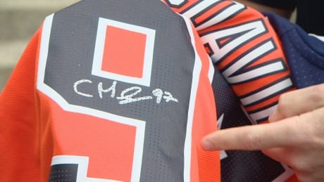 Edmonton police say this is a fake Connor McDavid signature on an authentic Oilers jersey. Fake McDavid signature