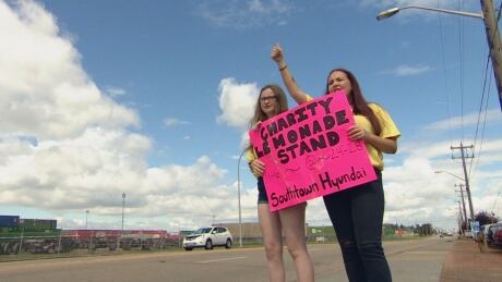 Sydney and Taylor Woodworth have raised more than $100,000 for the Stollery Children's Hospital in the 10 years of running their charity lemonade stand. lemonade stand