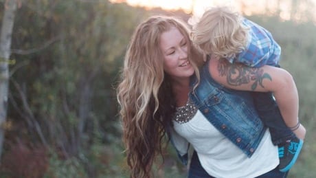 Ashley Ames shown with her son. Ashley Ames