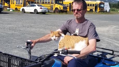 Fred the cat on the ATV