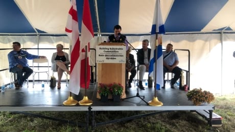 Eskasoni Chief Leroy Denny speaks at an announcement about funding for a long-term care home and a fibre optic cable in his community. Announcement