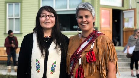 Tr'ondek Hwech'in Chief Roberta Joseph and Georgette McLeod, Hän Language Administrator stand in front of the newly-named Dënäkär Zho. The building was formerly the Klondike Institute of Art and Culture. Roberta Joseph Georgette McLeod