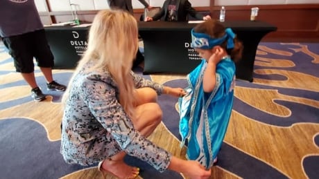 Three-year-old Meadow Joseph of Prince Rupert, B.C., won over wrestling star Charlotte Flair with her costume at the WWE SummerSlam in Toronto. Meadow and Flare