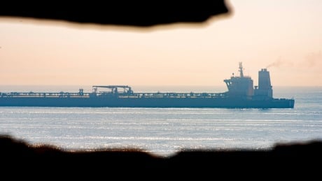 The Grace 1 supertanker sits off the coast of the British territory of Gibraltar on Friday, Aug. 16, 2019. The lawyer representing the captain of the Iranian supertanker, which is caught in a diplomatic standoff, said Friday that the captain no longer wants to be in command of the ship, which is in need of repairs that could prevent its immediate departure from Gibraltar. Gibraltar Persian Gulf Tension