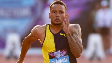 Andre De Grasse stops the clock in 10.13 seconds on Sunday to place fifth in the eight-man 100-metre final at the Muller Grand Prix Diamond League track and field meet in Birmingham, U.K. Jamaica's Yohan Blake won in a photo finish against Adam Gemili of Great Britain. de-grasse-andre-birm-190818-1180