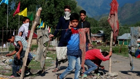 Schools reopen in Kashmir's main city but remain empty amid fears of continued unrest