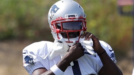 New England Patriots wide receiver Antonio Brown adjusts his gloves while working out during NFL football practice, Wednesday, Sept. 11, 2019, in Foxborough, Mass. Brown practiced with the team for the first time on Wednesday afternoon, a day after his former trainer filed a civil lawsuit in the Southern District of Florida accusing him of sexually assaulting her on three occasions. (AP Photo/Steven Senne) Patriots Antonio Brown Lawsuit Football