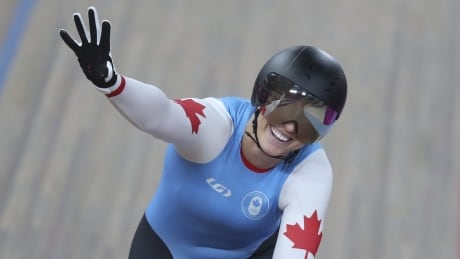 Kelsey Mitchell of Canada waves after winning the first sprint of her track cycling women's sprint final against Martha Bayona of Colombia at the Pan American Games in Lima, Peru, Sunday, Aug. 4, 2019. Mitchell did not own a bike when she was recruited into track cycling. Two years later, she's a world-record holder and winner of international gold. Her meteoric rise began when a Cycling Canada recruiter witnessed the raw power in her legs at a Training Ground session in September of 2017. THE CANADIAN PRESS/ AP/Fernando Vergara CYC OLY Canada Mitchell 20190912