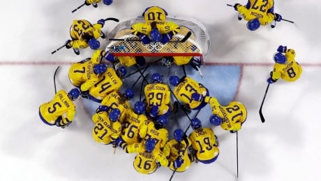 Sweden players gather before a game at the 2018 Winter Olympics. On Friday, the upcoming Four Nations tournament was cancelled by the Swedish Ice Hockey Federation after its players boycotted over pay and working conditions. Sweden Pay Dispute Women's Hockey