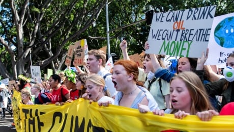 People take part in a protest to call for action on climate change in Sydney, Australia, September 20, 2019. CLIMATE-CHANGE/STRIKE-AUSTRALIA