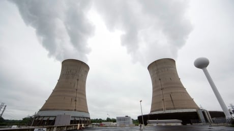 This May 22, 2017 file photo, shows cooling towers at the Three Mile Island nuclear power plant in Middletown, Pa. The shutdown of Three Mile Island, site of the United States' worst commercial nuclear power accident, is imminent. Exelon Corp. officials said the plant will stop producing electricity Friday, Sept. 20, 2019, following through on a decision the Chicago-based energy giant made in May after it became clear that it would not get a financial rescue from Pennsylvania. three mile island closure