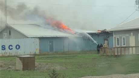 Firefighters try to fight the blaze at the Canupawakpa Dakota First Nation community centre. The entire building was burnt to the ground. Canupawakpa Dakota First Nation fire