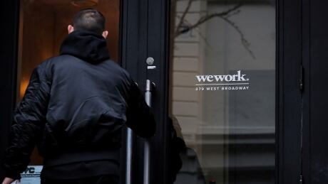 A man enters a WeWork co-working space in New York City, New York U.S., January 8, 2019. WEWORK-IPO/SOFTBANK GROUP