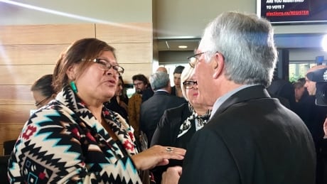 Inquiry head Jacques Viens, right, on Monday released his report into Quebec's treatment of Indigenous people. Viviane Michel, left, is the president of Quebec Native Women. Viens