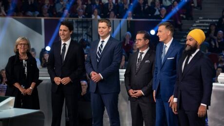From left, Green Party leader Elizabeth May, Liberal Leader Justin Trudeau, Conservative Leader Andrew Scheer, Bloc Quebecois Leader Yves-Francois Blanchet, People's Party of Canada Leader Maxime Bernier and NDP Leader Jagmeet Singh pose for a photograph before the Federal leaders debate in Gatineau, Que. on Monday, Oct. 7, 2019. FedElxn Campaign 20191007