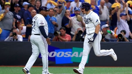 Willy Adames of the Tampa Bay Rays celebrates after hitting a home run against the Houston Astros along the way to a 4-1 win in Game 4 on Tuesday night at Tropicana Field. 1179890026