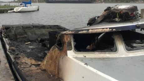 The back of Membertou II, with what appears to be lobster traps in the back. John Paul said the boat is a write off. Membertou II fire