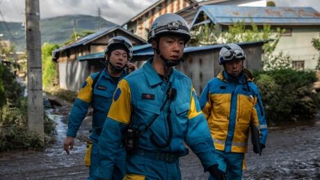 NAGANO, JAPAN - OCTOBER 15: Rescue workers search for bodies after heavy flooding caused by Typhoon Hagibis, on October 15, 2019 in Hoyasu near Nagano, Japan. Japan has mobilised over 100,000 rescue workers after Typhoon Hagibis, the most powerful storm in decades, swept across the country killing 66 people and leaving thousands injured and homeless. 1175989449