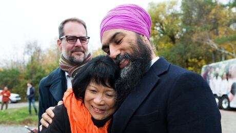NDP leader Jagmeet Singh, hugs Olivia Chow, widow of former NDP leader Jack Layton as they make an announcement at Jack Layton Park during a campaign stop in Hudson, Que., on Wednesday, October 16, 2019. FEDELXN NDP 20191016