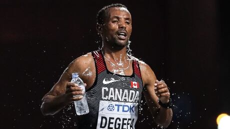 The International Olympic Committee wants to move next summer's Olympic marathons from Tokyo to Sapporo, where temperatures are 5-6C cooler during the day. Canada's Berhanu Degefa was among the many to run in the searing heat at the recent track and field world championships in Doha, Qatar. degefa-berhanu-191006-1180