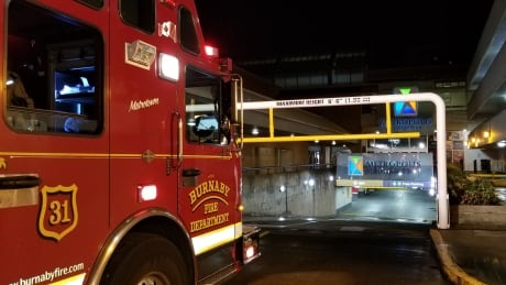 Firefighters investigate a small fire in Burnaby's Metrotown shopping mall. Metrotown fire