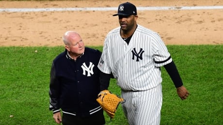 New York Yankees starter CC Sabathia walks off the field after dislocating his elbow in Game 4 of the ALCS. Sabathia won't pitch again this season, and previously said he was planning on retiring this off-season. sabathia-cc-101819