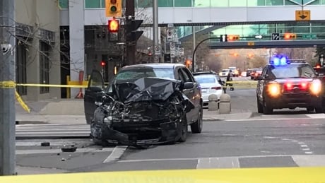 Police say driver who sped through parade barricade in Calgary has no extremist links