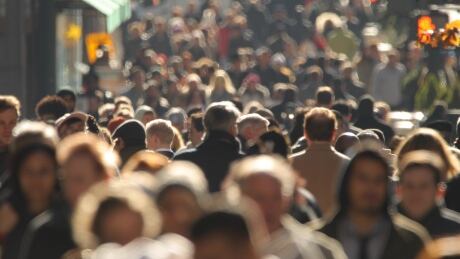 Some people believe that the world is too populous and that keeping a lid on population growth could be an answer to battling climate change. Crowd of people