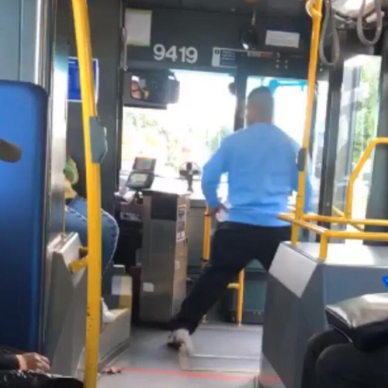 Suspect seen spitting on bus driver in violent video