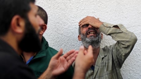 A relative of a Palestinian, who was killed in an Israeli strike, reacts at Shifa hospital in Gaza City November 13, 2019. REUTERS/Mohammed Salem - RC29AD9PIFTK ISRAEL-PALESTINIANS/VIOLENCE