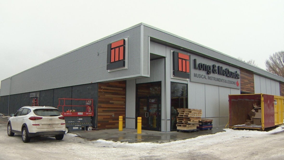 Swan song for old Axe Music location as Long & McQuade opens new store