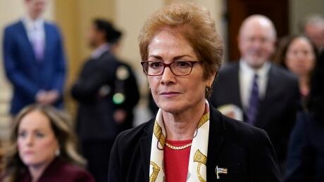 WASHINGTON, DC - NOVEMBER 15: Former U.S. Ambassador to Ukraine Marie Yovanovitch returns for additional questioning after a break while testifying before the House Intelligence Committee in the Longworth House Office Building on Capitol Hill November 15, 2019 in Washington, DC. In the second impeachment hearing held by the committee, House Democrats continue to build a case against U.S. President Donald Trump’s efforts to link U.S. military aid for Ukraine to the nation’s investigation of his political rivals. (Photo by Win McNamee/Getty Images) 1187879953
