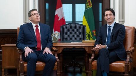 Prime Minister Justin Trudeau and Premier of Saskatchewan Scott Moe wait for media to leave the office after a photo op on Parliament Hill in Ottawa, on Tuesday, Nov. 12, 2019. Moe and Trudeau