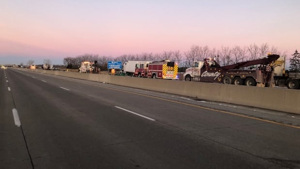 2 transport trucks collide on Highway 401 in Tecumseh, westbound lanes closed - CBC.ca