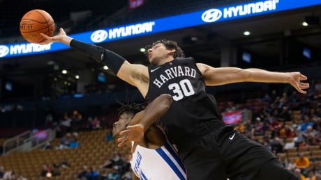 Harvard Crimson's Danilo Djuricic (right) from Brampton, Ont., was one of three Canadians to start in the James Naismith Classic against the University of Buffalo at Scotiabank Arena. BKO NCAA Naismith Classic 20191116