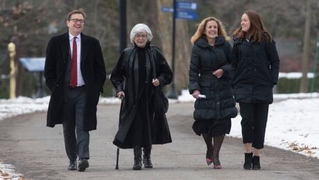 Liberal MP Jonathan Wilkinson, left, shares a laugh with family as he arrives for the cabinet swearing in ceremony at Rideau Hall in Ottawa. Jonathan Wilkinson