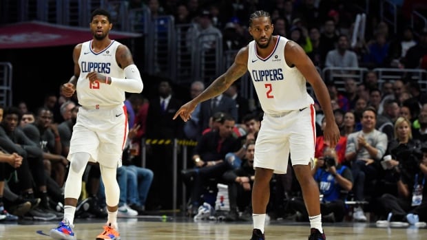 Kawhi Leonard's block seals Clippers' OT win in 1st game alongside Paul George