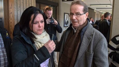 Amanda Huckle stands with Her father, Glen Assoun, at Nova Scotia Supreme Court in March. Assoun Daughter Police 20191121