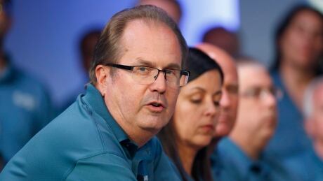 In this July 16, 2019, file photo, Gary Jones, United Auto Workers President, speaks during the opening of their contract talks with Fiat Chrysler Automobiles in Auburn Hills, Mich. Jones is taking a paid leave of absence amid a federal investigation of corruption in the union. The UAW said Jones requested the leave, which is effective Sunday, Nov. 3. The federal government has been investigating fraud and misuse of funds at the UAW for more than two years. UAW President Leave