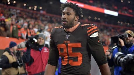 Cleveland Browns defensive end Myles Garrett walks off the field after he was ejected against the Pittsburgh Steelers on Nov. 14. Steelers Browns Football