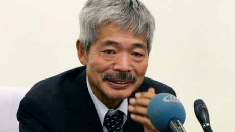 FILE- In this Aug. 28, 2008, file photo, Tetsu Nakamura, who has headed the Japanese charity, Peace Medical Service, speaks during a press conference regarding the killing of the Japanese aid worker Kazuya Ito, at the Japanese embassy in Kabul, Afghanistan. An Afghan official said Japanese doctor Nakamura is in serious condition after an attack in eastern Nangarhar province that killed five Afghans, including his bodyguards, driver and a passenger, Wednesday, Dec. 4, 2019. Afghanistan