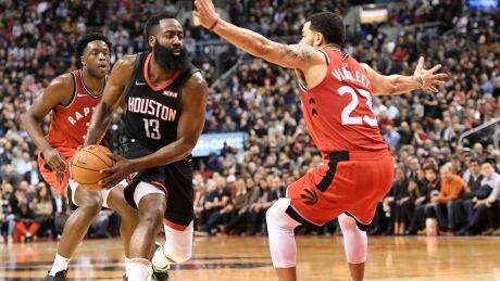 Houston Rockets guard James Harden (13) drives around Toronto Raptors guard Fred VanVleet (23) during second half NBA action en route to 119-109 victory in Toronto on Thursday. BKN Rockets Raptors 20191205
